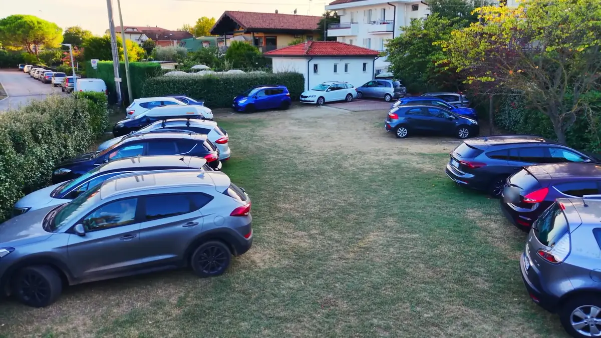 The residence’s inner car park from above, with the guests’ cars